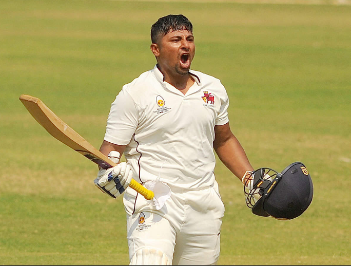 Sarfaraz Khan impresses with a half-century on his Test debut against England in Rajkot.