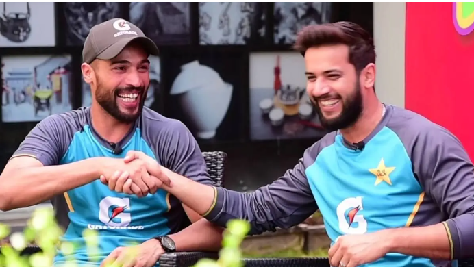 Image of Mohammad Amir and Imad Wasim, cricketers, celebrating their return to the Pakistan national team.
