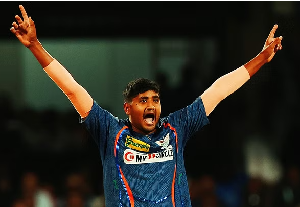 Yash Thakur celebrates after taking a wicket during the IPL match against Gujarat Titans.