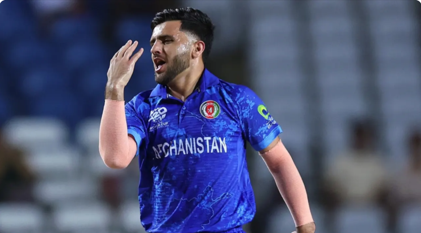 Fazalhaq Farooqi celebrates after taking a wicket during the T20 World Cup 2024, showcasing his impressive bowling skills.